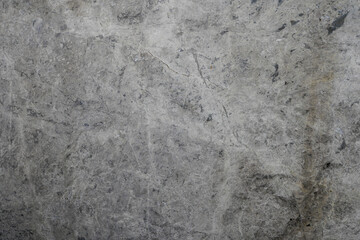 Fototapeta premium Textured Gray Marble Background with Subtle Veins and Variations, Ideal for Elegant Design Projects, Home Decor or Fashion Applications