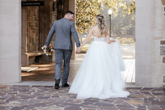 bride and groom walking