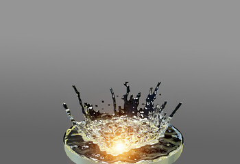 gold and grey metallic paint oil splash. Orange liquid honey or oil splash. Provocative viscous liquid abstract splash art in contemporary décor Orange and yellow background.