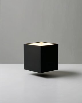 Minimalist cube lantern for modern decor on a plain black background