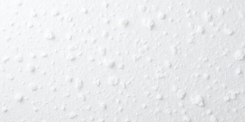 Obraz premium Grainy white plastic background resembling snowfall, macro, clean