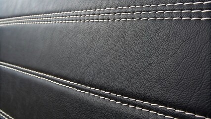 Black leather background with horizontal stitched details, minimalist aesthetic, black leather, clothing material, stitched leather, textile design