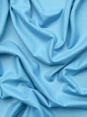 Obraz premium Elegant blue fabric draped in soft folds, blue, luxurious