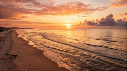 Obraz premium A warm golden light casts a serene glow on a tranquil ocean as the sun sets over a vast and idyllic beachscape, peaceful landscape, sandy beach, seagulls, tranquility