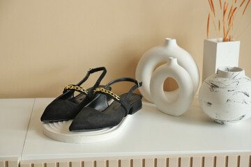 Stylish Black Slingback Shoes Placed on a Beautifully Minimalist Table Decor Setting