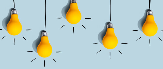 Hanging idea light bulbs - Business concept - Flat lay