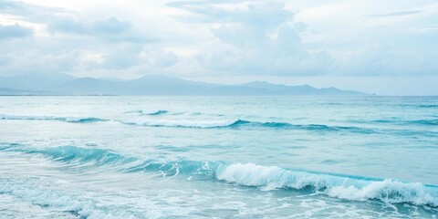 Obraz premium Soft light blue watercolor for a serene oceanic landscape, subtle gradient, calming