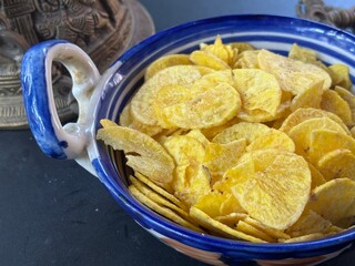 A bowl of tasty banana chips