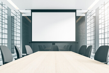 Front view on blank white screen with copyspace for your text or logo in modern boardroom with wooden table, grey chairs and walls and metal muntins on windows. 3D rendering, mockup