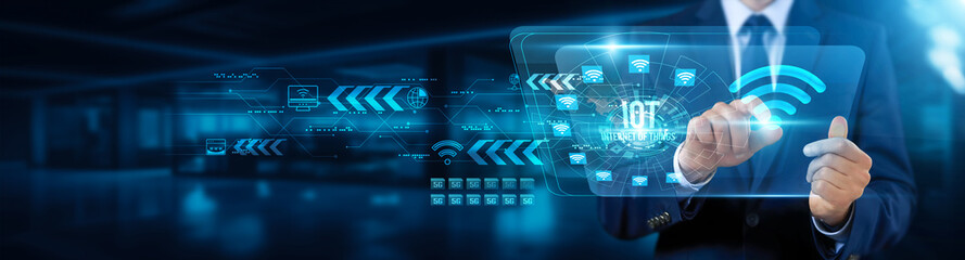 IOT, Businessman touching interface and Internet of Things, digital transformation, smart devices integration, connected technologies, real-time data analytics, automation systems concept.