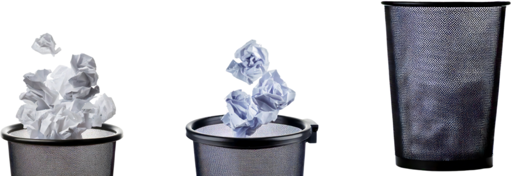Conceptual Image of Crumpled Paper Tossed into a Trash Can Illustrating Waste Disposal and Office Organization Techniques for Improved Productivity