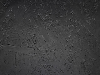Dark natural background. The wooden base is black. The backdrop. Copy space