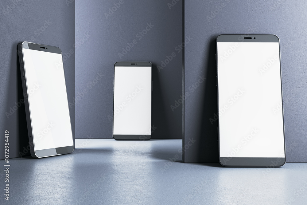 Poster modern smartphones with blank screens arranged against dark walls and floor. 3d rendering
