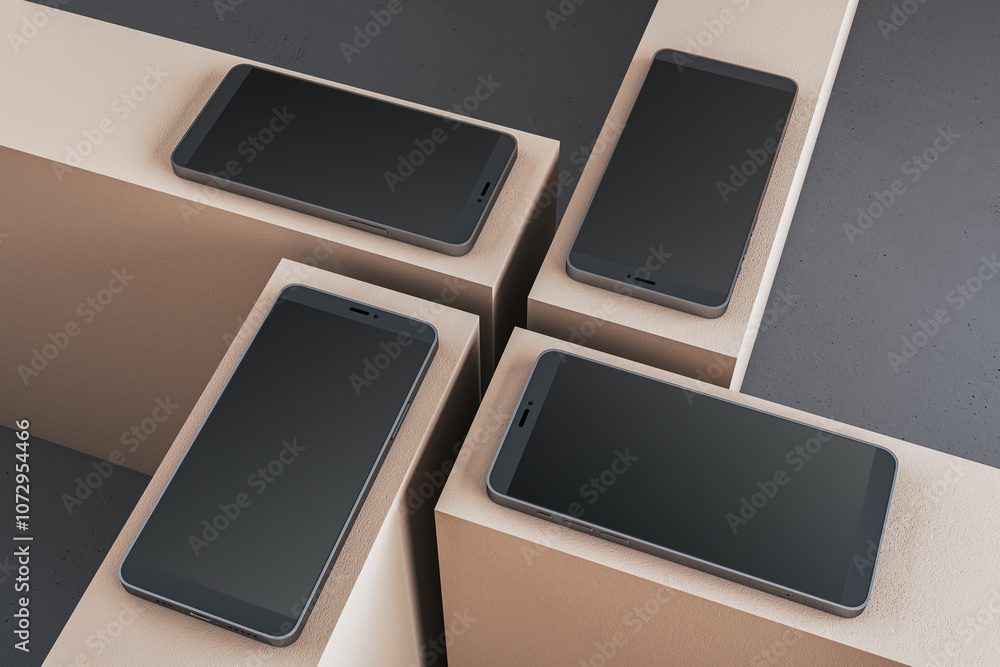 Aufkleber Four modern smartphones with blank screens displayed on beige geometric blocks. Minimalist design on a dark surface. 3D Rendering