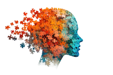 A conceptual image of a human head filled with puzzle pieces that gradually blend from vibrant colors at the top to softer tones at the bottom