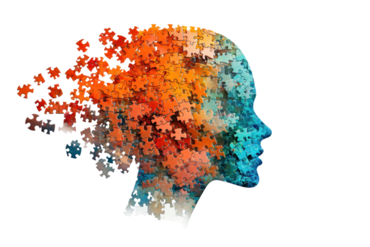 A conceptual image of a human head filled with puzzle pieces that gradually blend from vibrant colors at the top to softer tones at the bottom