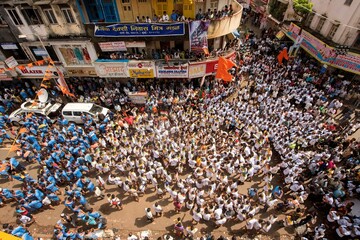 Men making human pyramid to break Dahi Handi, Janmashtami festival, Bombay, Mumbai, India