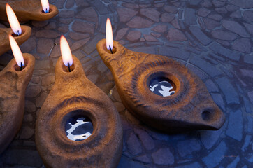 Lamps shining, reference to the parable of the ten virgins, five of whom brought extra oil. Matthew 25, teachings of Jesus. 3d rendering biblical illustration.