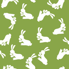 Seamless pattern with white silhouette Easter rabbits on color background. Design for card, postcard, wallpaper, fabric, textile. Vector stock illustration. Cartoon style
