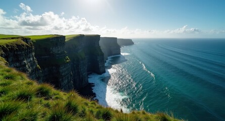 Towering cliffs and rolling waves at the Cliffs of Moher, Ireland, captured with natural lighting, creating a dramatic seascape with rugged rocks and lush grass.