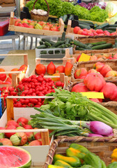 fruits and vegetables for sale at the greengrocer's stall in summer in a Mediterranean location