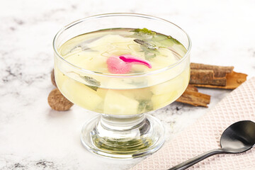 Sweet pineapple jelly with mint