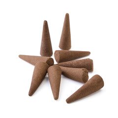 Pile of sandalwood incense cones, isolated on white background.