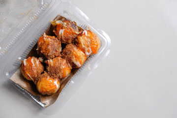 Indonesian street food snack takoyaki.
