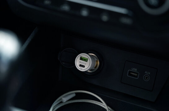 dual port mobile car charger plugged in the car