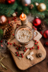 cup of coffee on table with christmas decorations background bokeh top view flatlay