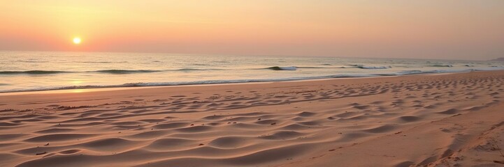 Sunset on a deserted beach with fine sand, sky, fire pit, beach ball