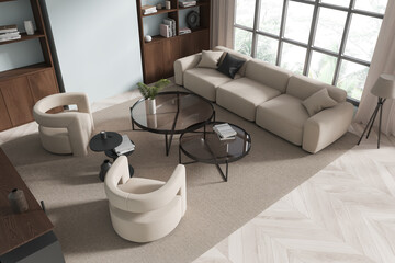 Top view of home living room interior with sofa, shelf and panoramic window