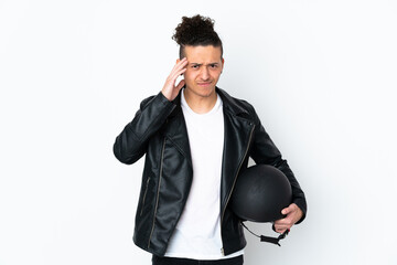 Caucasian man with a motorcycle helmet over isolated white background unhappy and frustrated with something. Negative facial expression