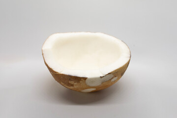 peeled coconut isolated on white background