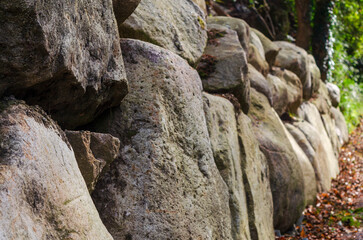 Wall built with boulders alongside a river in Mourne Mountains