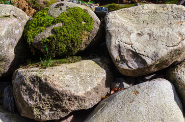 Wall built with boulders alongside a river in Mourne Mountains