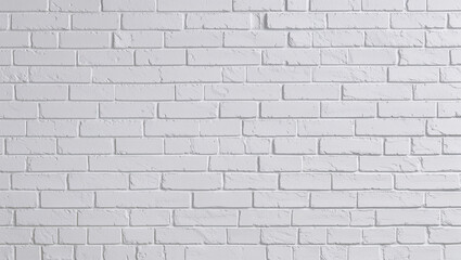 Light gray brick wall revealing a lightly textured surface pattern