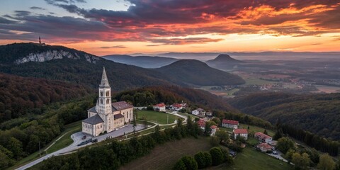 Stunning Silhouette of Htastovlje Village with St. Trinity Church Against the Majestic Kraski Rob Ridge at Dusk &ndash; A Captivating Panorama for Scenic Photography Enthusiasts