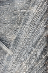 Black and white grunge ice texture with scratches and lines abstract background