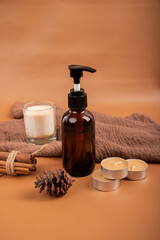 Amber Glass Pump Bottle with Candle, Cinnamon Sticks, and Reed Diffuser for Aromatherapy and Spa Decor