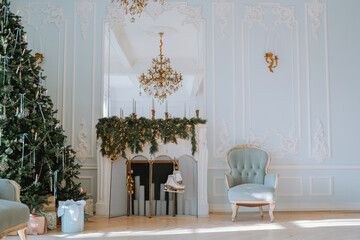 Elegant Christmas living room with a decorated tree and cozy armchair