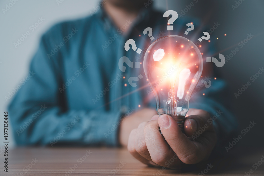 Poster businessman hold glowing lightbulb with questions mark symbol for creative thinking idea and problem