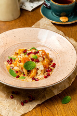 Sweet dessert made from oranges, beautifully served in a cafe, restaurant, rustic.