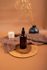 Amber Glass Dropper Bottles on Woven Mats for Natural Skincare and Essential Oils