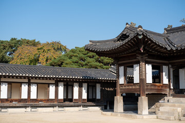 Korean traditional building in Changdeokgung palace. It is one of the Five Grand Palaces built by the kings of the Joseon dynasty. with beautiful autumn foliage.