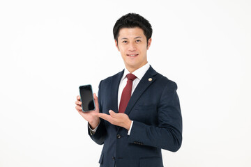 スマホを持つ男性弁護士