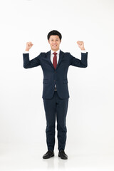 ガッツポーズをするビジネスマン