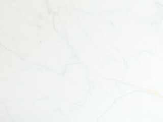 Close-up of textured white marble surface showcasing soft gray and golden veining under natural light at midday