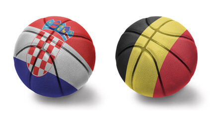 basketball balls with the national flags of belgium and croatia on the white background.