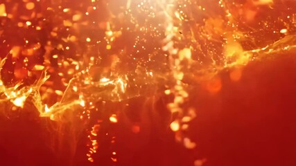 Golden particles float gracefully in dark space